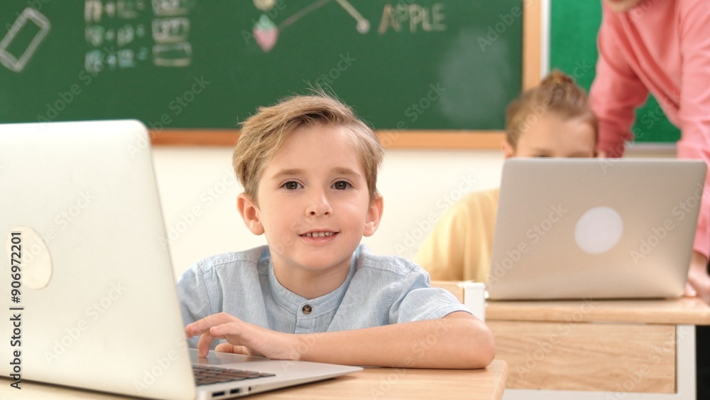 Poster attractive caucasian boy looking at camera while studying math at school. diverse cute student doing