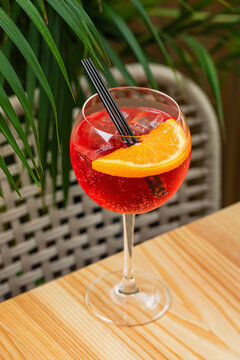 Refreshing aperitif cocktail in a wine glass
