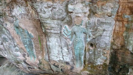 Cambodia. Bas-reliefs in the jungle on Phnom Kulen Mountain in the National Park. Siem Reap...