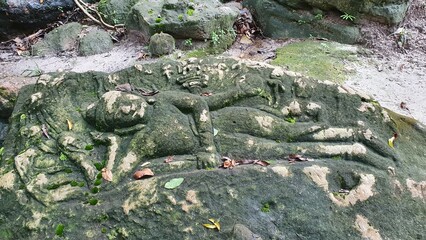 Cambodia. Bas-reliefs in the jungle on Phnom Kulen Mountain in the National Park. Siem Reap province. 