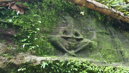 Cambodia. Bas-reliefs in the jungle on Phnom Kulen Mountain in the National Park. Siem Reap province. 