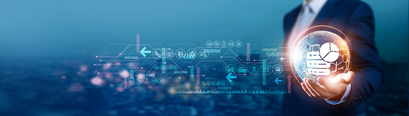 BIG DATA. Businessman holds global big data with network connected to various business sectors and...