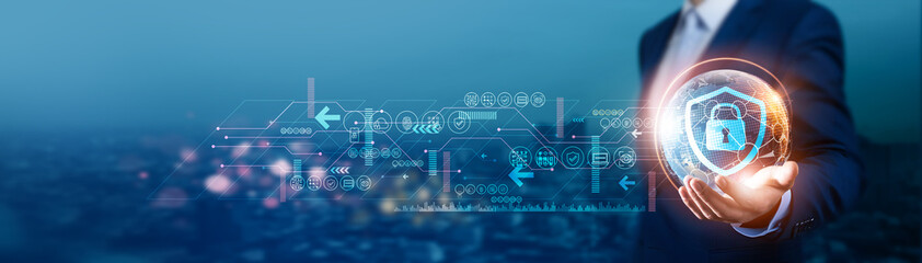 Businessman holds global cybersecurity with network connected to data protection, and threat...