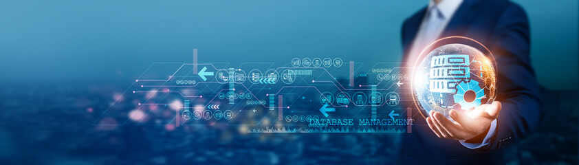 Database. Businessman hold global database management with network connected to cloud infrastructure and data centers. Software development is crucial to ensuring efficient data handling and security.