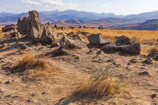 Standing stones in Zorats-Karer or Karahunj. Ancient megalithic complex, Syunik region of Armenia. Historical and cultural reserve