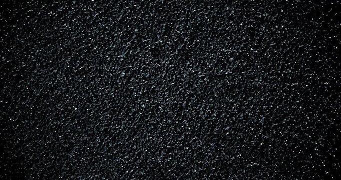 Black sand grunge background. Сlose-up.