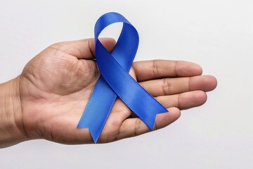 Doctor hand holding blue ribbon, cancer awareness concept