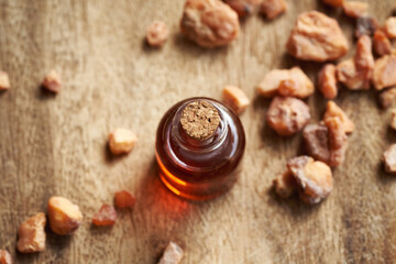 A bottle of aromatherapy essential oil with styrax benzoin resin
