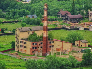 Ruins of Abandoned Factory Being Reclaimed by Nature