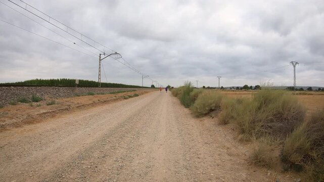 Camino del Ebro - a gravel road along the railway between Quinto and Fuentes de Ebro, province of Zaragoza, Aragon, Spain