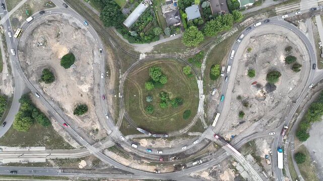 Reconstruction of a large roundabout. Reconstruction of the road and streets on a large roundabout. Roundabout in Bedzin, Poland. Aerial drone view of the reconstruction of the roundabout, roadworks.