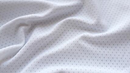 White linen jersey. White matte knitted fabric. Texture of knitted fabric. Textile light white...