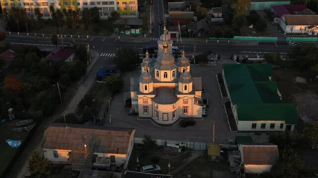 An Aerial View of a Beautiful and Serene Church at Sunset, Capturing Its Architectural Splendor. Belarus, Dobrush town