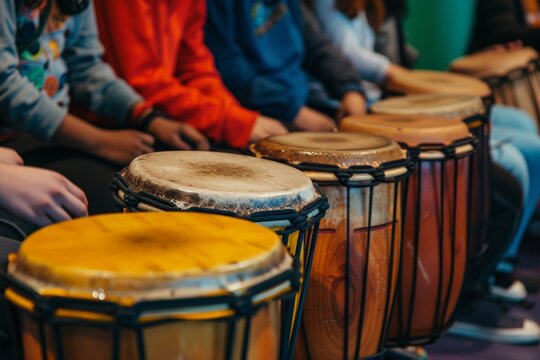 Music School Percussion Class with Students Learning Various Rhythms on Congas, Bongos, and Djembes