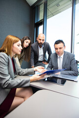 Business persons on meeting in the office.