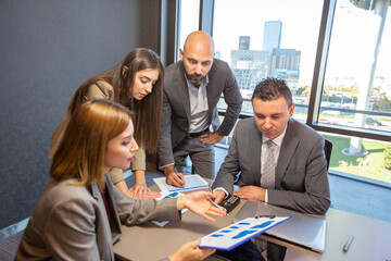 Business persons on meeting in the office.
