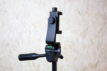 Smartphone tripod. Device for attaching a smartphone to a tripod, holder, static stabilizer.