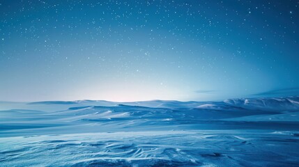 Fototapeta premium Tranquil winter landscape with snow-covered fields and clear starry night sky, peaceful and magical holiday scene, background with space for text.