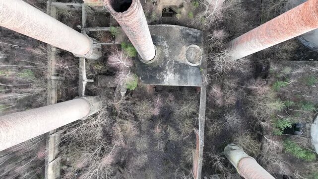 Aerial drone view of an old cement factory. Abandoned cement factory entered into the register of monuments. Grodziec Cement Plant, Bedzin, Poland.