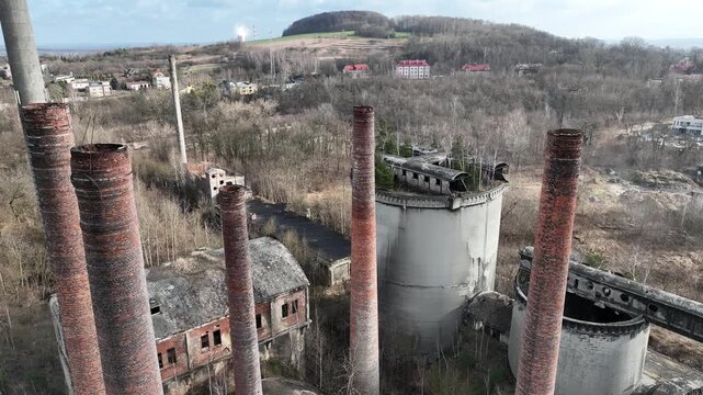 Aerial drone view of an old cement factory. Abandoned cement factory entered into the register of monuments. Grodziec Cement Plant, Bedzin, Poland.