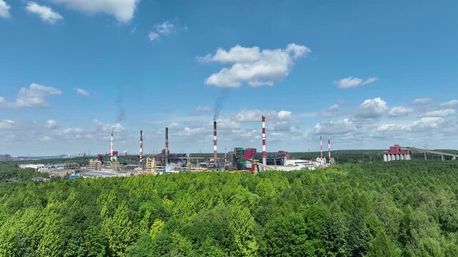 Aerial drone view Coking Plant factory. Coke plant. Heavy industry in Europe, Poland, Dabrowa Gornicza. Air pollution from chimneys. Industry, Ecology and environmental.