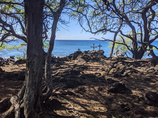 A beautiful rainbow against blue skies on a sunny day in Maui, Hawaii.