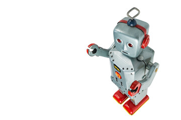A very antique tin robot toy airplane isolated in white with clipping path.
Retro gray and red...
