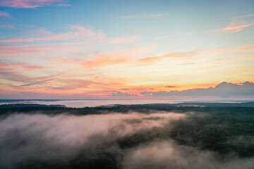 Boothbay Harbor West at sunset in Summer with a foggy mist aerial drone