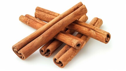 Neatly arranged cinnamon sticks displayed on a white background, highlighting their brown color and textured surface, commonly used in culinary and baking.