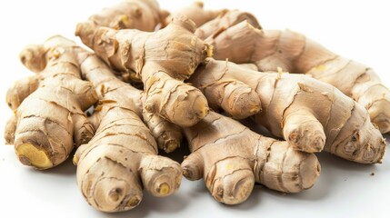 Fototapeta premium This image features fresh ginger roots with a detailed texture, laid across a white surface to prominently display their natural and knobby characteristics.