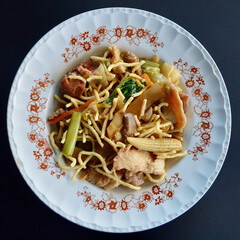 A closeup of delicious Chinese combination chow mein on the table. 