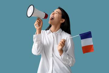 Female French language teacher with megaphone and flag on blue background