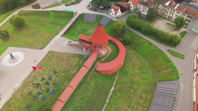 Aerial footage of Kaunas Castle, Kaunas castle amphitheater and Vytis Monument in Kaunas, Lithuania