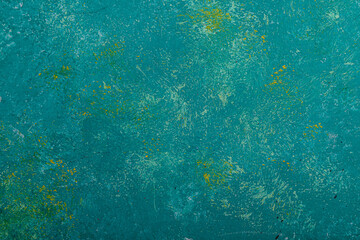 blue green rustic texture background with pints of yellow