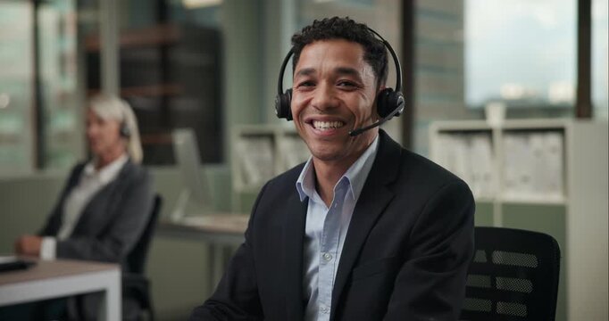 Face, happy and man in call center office for customer service, consulting and business crm. Male advisor or agent, inbound telemarketing and headphone for listening, communication and faq support.
