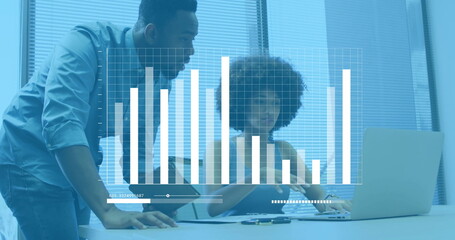 Image of financial data processing over diverse colleagues discussing work in office