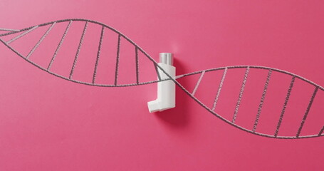 Inhaler placed within DNA strand image on pink background