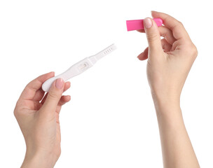 Woman holding pregnancy test on white background, closeup