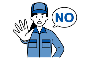 右手を前に出してNOと言うつなぎ作業服の女性