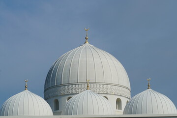 view of mosque dome against blue sky