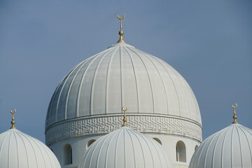 view of mosque dome against blue sky