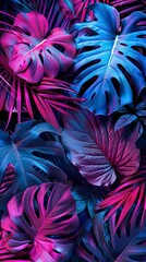 Creative fluorescent color layout made of tropical leaves