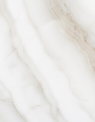 Obraz premium White marble with a smooth surface and a subtle natural pattern.
