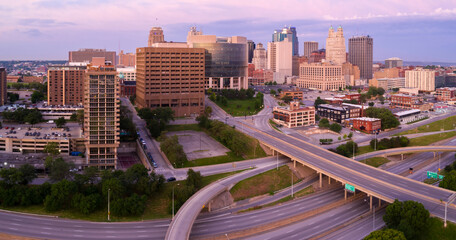 Freeway and downtown Kansas City at sunrise, Missouri, United States Of America. © Zenstratus