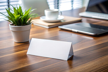 Blank white paper table tent on wooden office desk