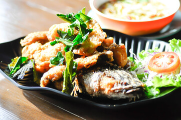 sliced fish or fried fish , fried tilapia fish