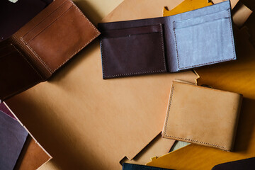 Genuine bifold wallet leather working with tool craftmanship on leather background handmade wallet