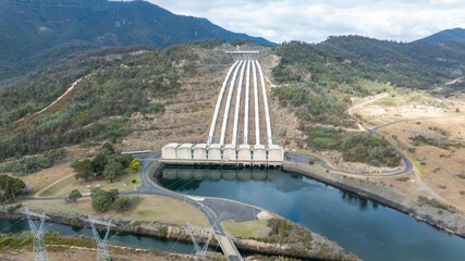 Drone aerial photograph of the Snowy Hydro Tumut 3 power station near Talbingo in the Kosciuszko National Park in the Snowy Mountains in New South Wales in Australia.