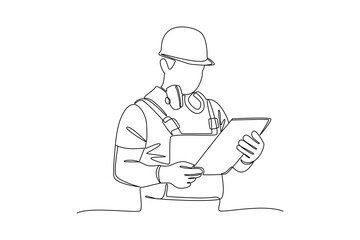 construction worker looking at project notes. Labor Day