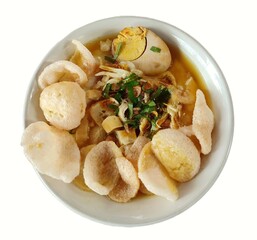 Bubur ayam or Chicken porridge, an Indonesian culinary treasure isolated in white background